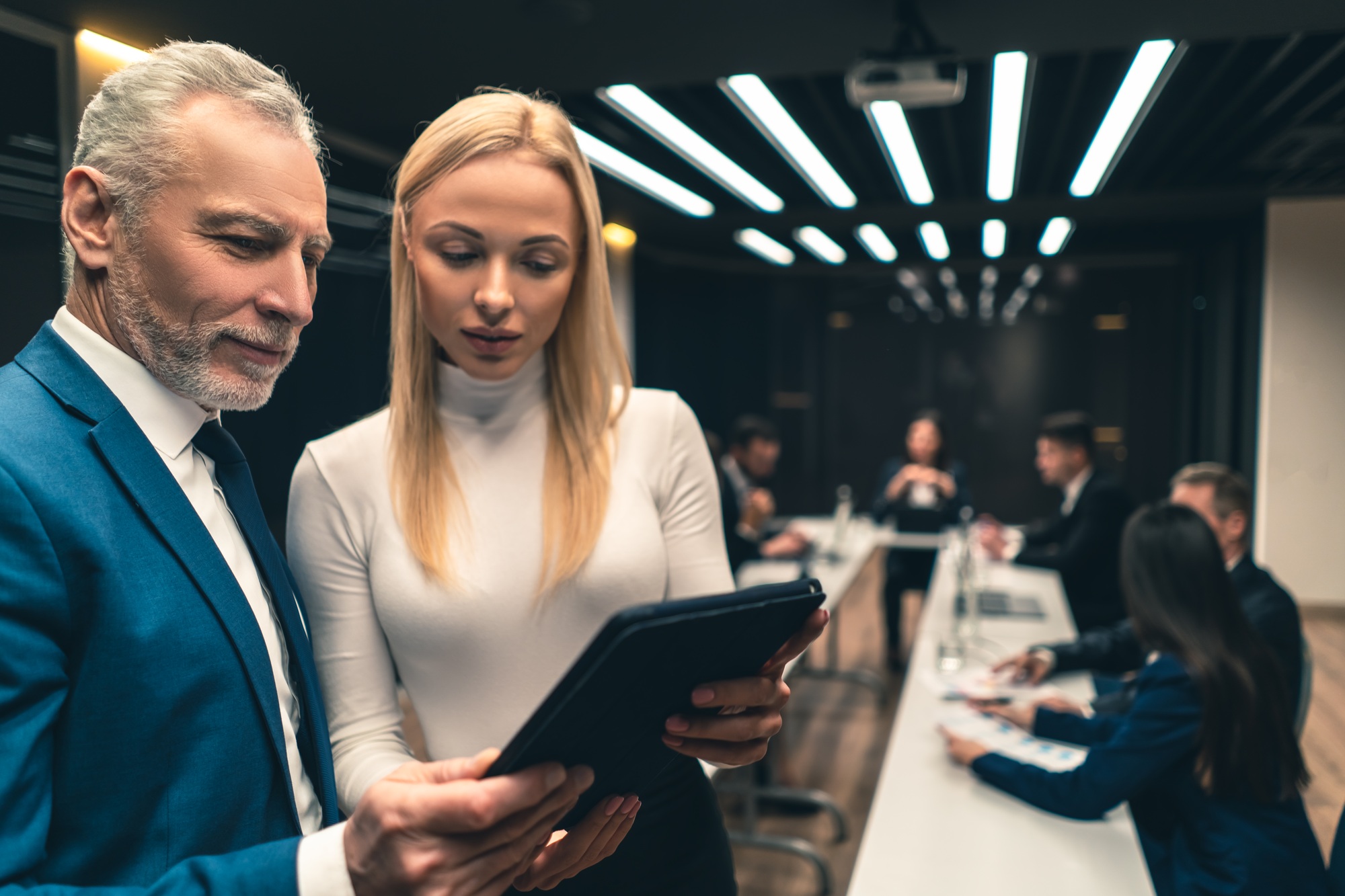 The young business assistant with her boss.